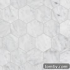 Hexagonal white marble tiles for a classic bathroom floor.
