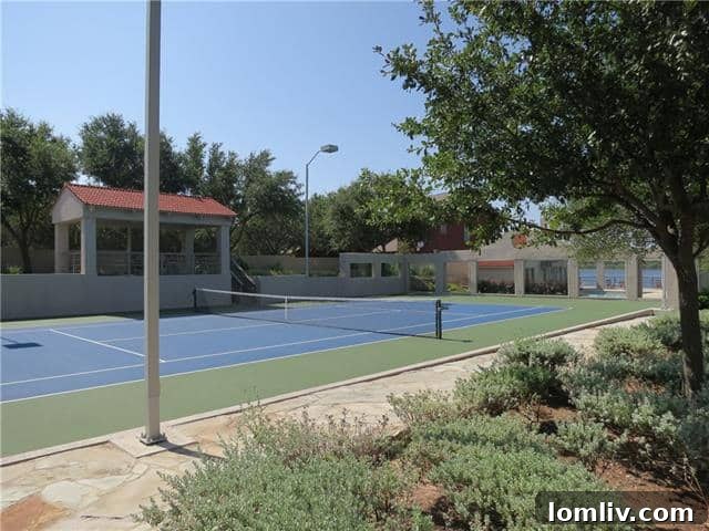 Private tennis court with pavilion and stunning lake views at Agarita Circle
