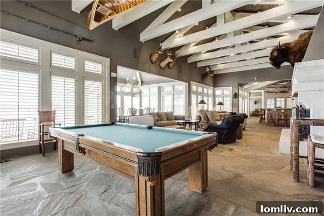 Spacious game room with billiards table and entertainment options at the lake house