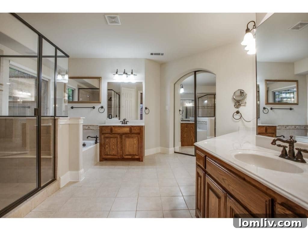 Luxurious Master Bathroom with Soaking Tub and Dual Vanities