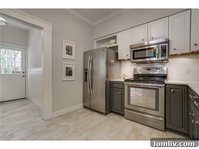 Detailed view of the kitchen design, highlighting the tile floor and overall aesthetic