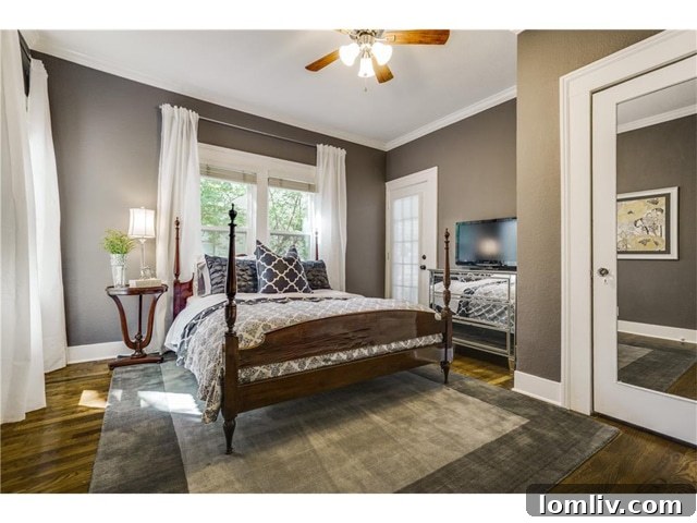 Cozy and well-lit second bedroom in the renovated Tudor home