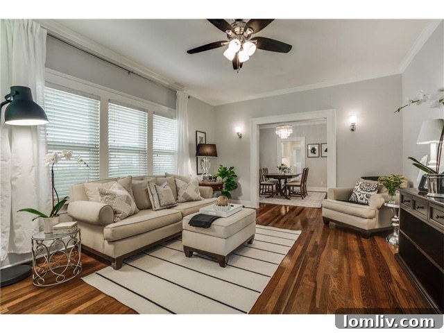 View of the spacious living room with natural light and classic architecture