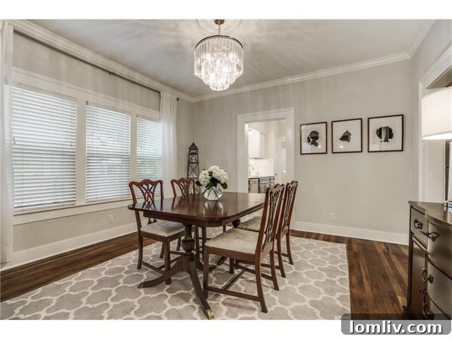 Dining room with classic chandelier and abundant natural light