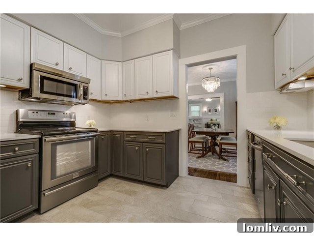 Modern kitchen with subway tile backsplash and two-tone cabinetry