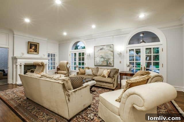 Inviting entryway with a grand staircase and original details