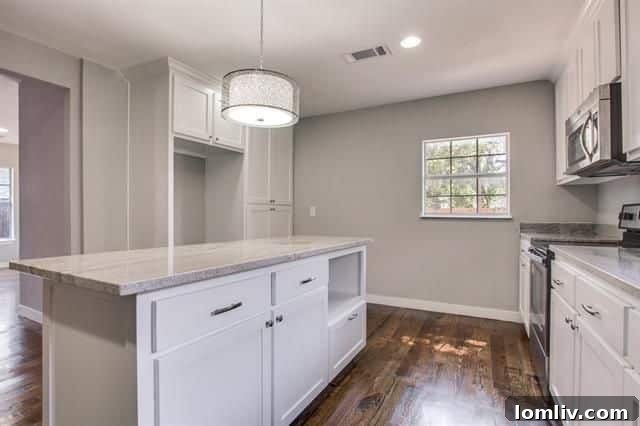 The dining area seamlessly integrated with the open kitchen, promoting a connected living experience.