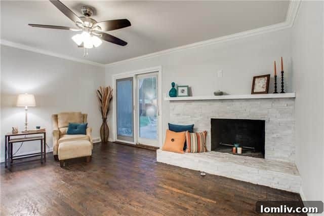 Living Room Showcasing New Fixtures and Crown Molding