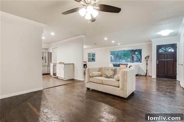 Open Concept Living Area Flowing into Dining Space