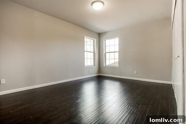 Bright Master Bedroom with Hardwood Floors