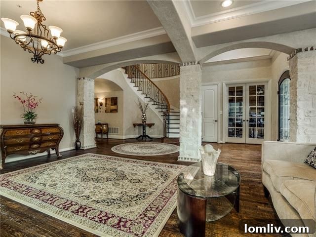 Expansive family room in the University Park French Traditional home