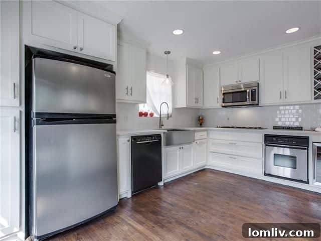 Modern and bright kitchen with quartz countertops and stainless steel appliances