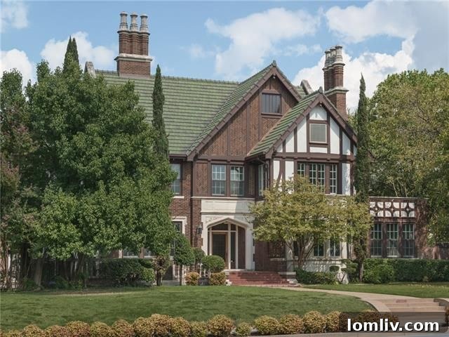 Elegant facade of the 1926 Jacobean Tudor in Dannelly's Summit Hill, Dallas