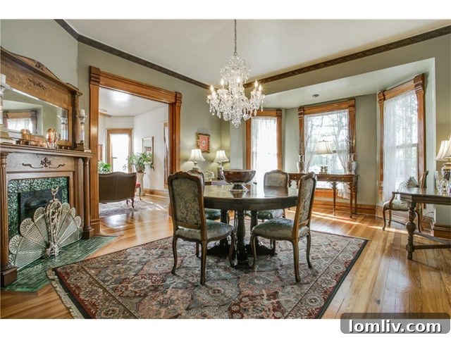 Formal dining room with vintage chandelier at 802 Brown Street