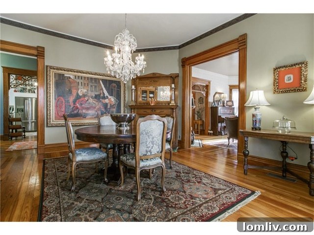 Waxahachie's Victorian Farmhouse A Serendipitous Gem 16 Dining room showing restored woodwork and ample light at 802 Brown Street