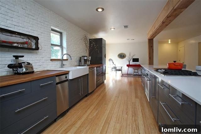 Spacious living area with large windows at 1617 Nob Hill Dr, showcasing natural light