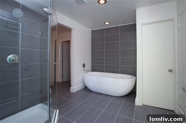 Master bedroom with direct pool access and lush views in Kessler Woods