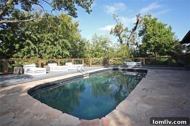 Aerial view of 1617 Nob Hill Dr showing secluded hilltop location