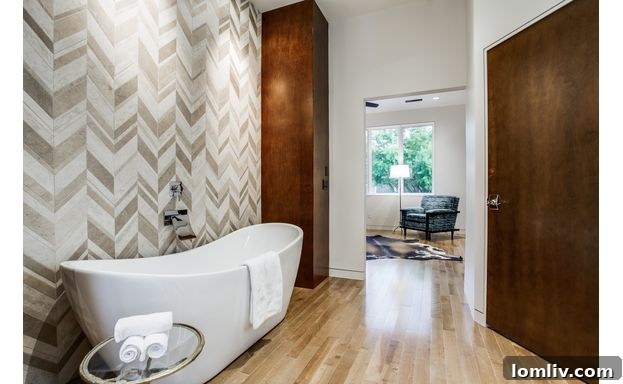 Elegant Master Bathroom Featuring Chevron Pattern Tile