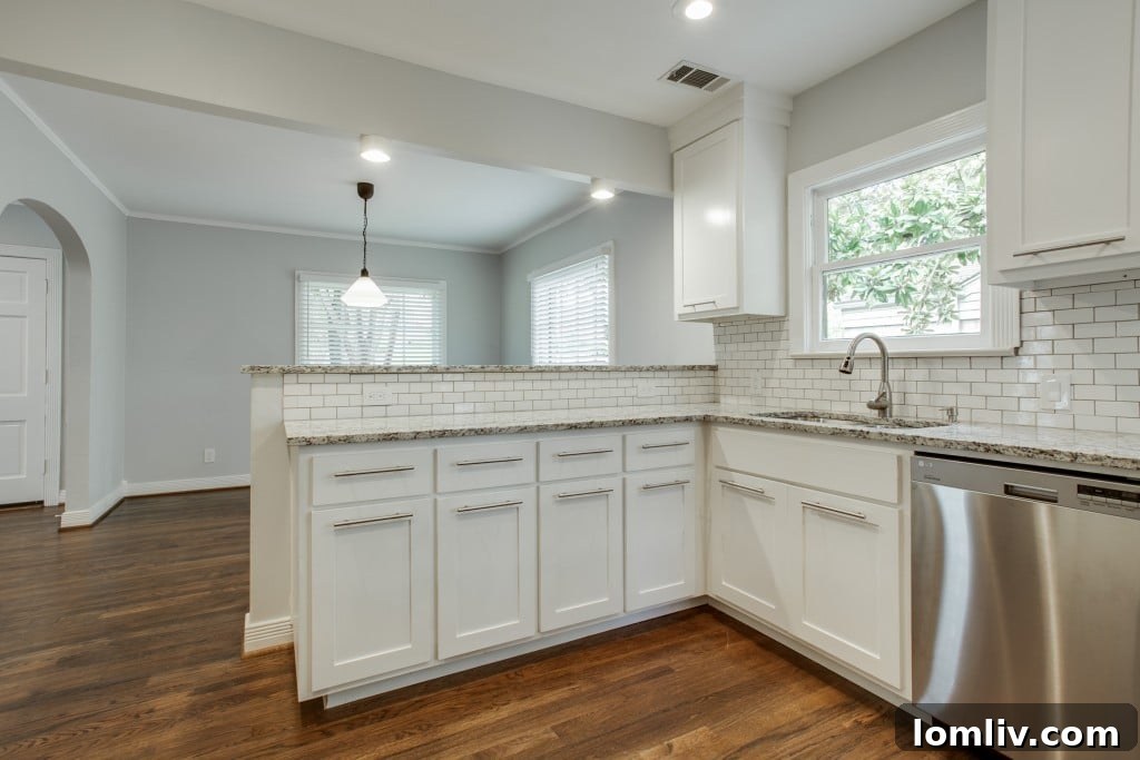Detailed shot of the kitchen showing subway tile backsplash and gas range.