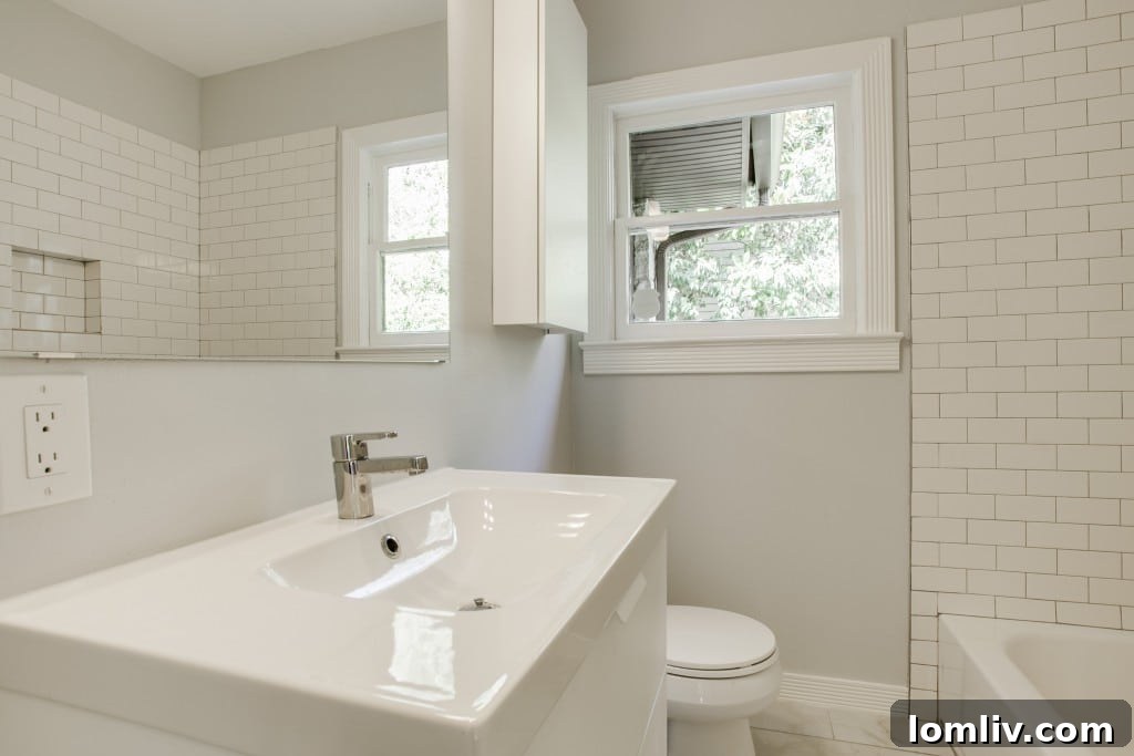 Detail of custom white cabinets and hardware.