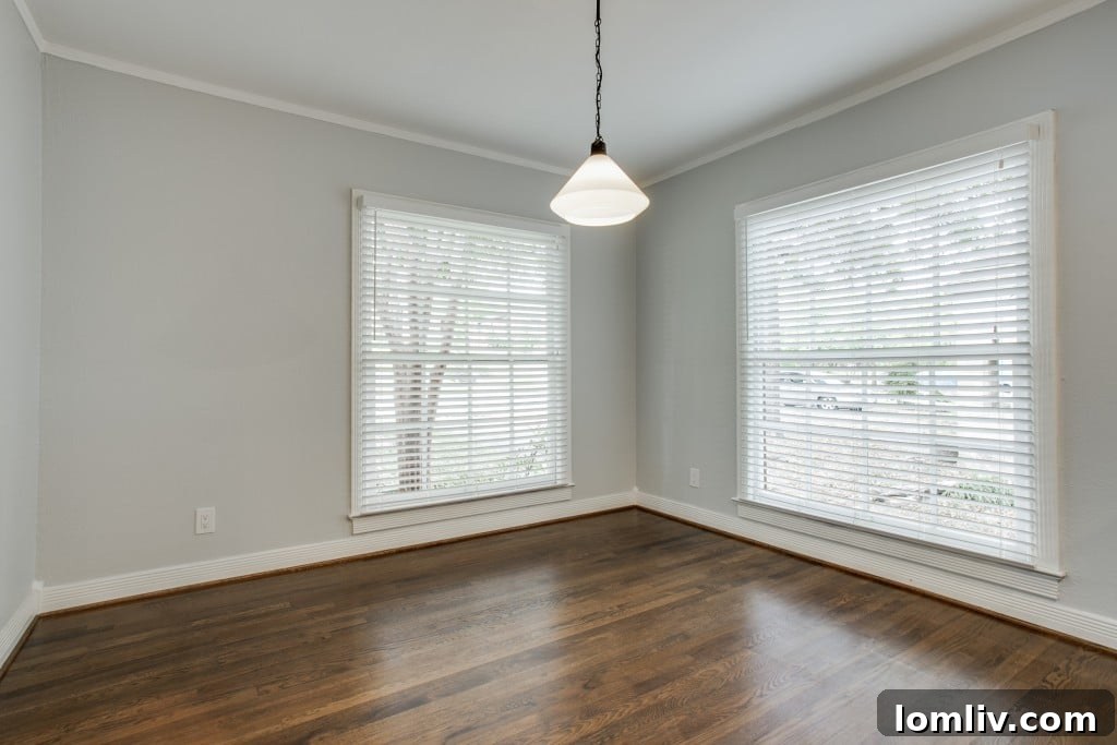 Dining area with view into the renovated kitchen.