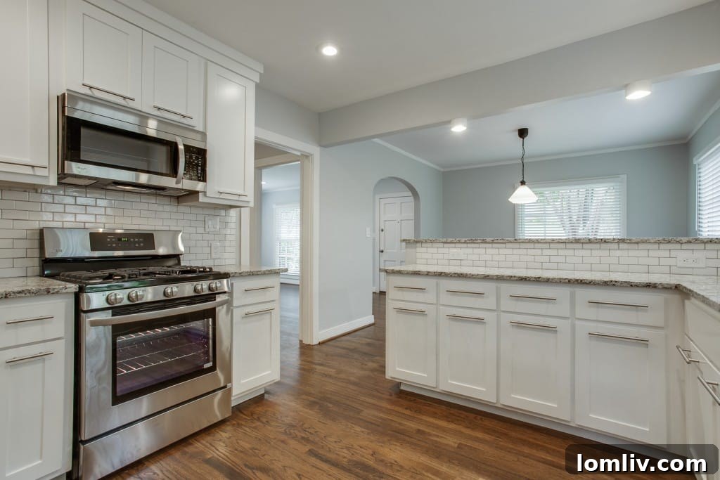 View of the kitchen island and breakfast bar area.