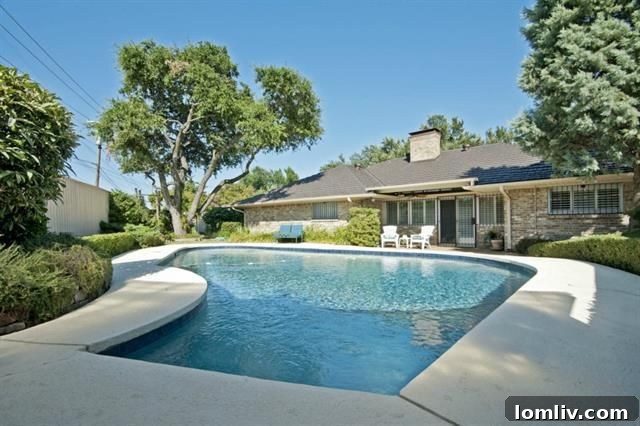 Serene backyard with direct access to Northaven Trail from 10815 Royal Park Dr.