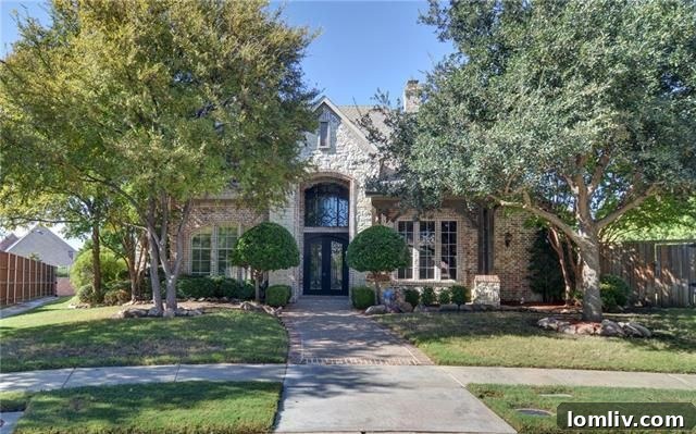 Luxurious exterior of the home at 4800 Northshore Dr, Frisco.