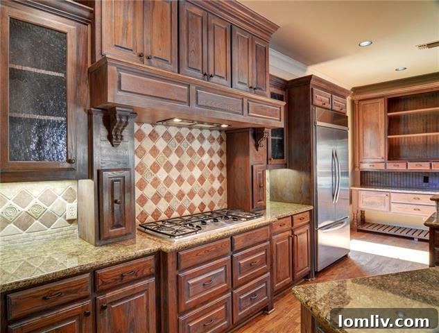 Expansive kitchen with granite countertops and double ovens at 4800 Northshore Dr.