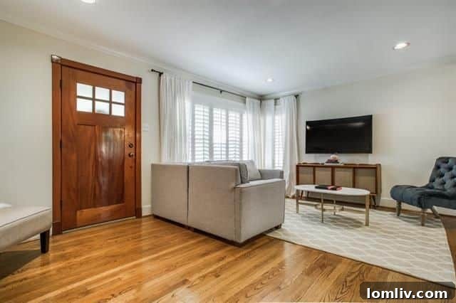 Inviting living area of the updated Midcentury home at 4135 Saranac Dr.
