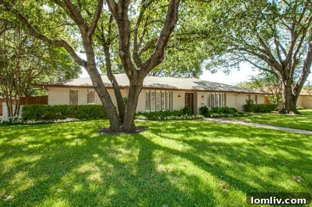 Traditional ranch home exterior with mature trees at 6948 Heatherknoll Dr
