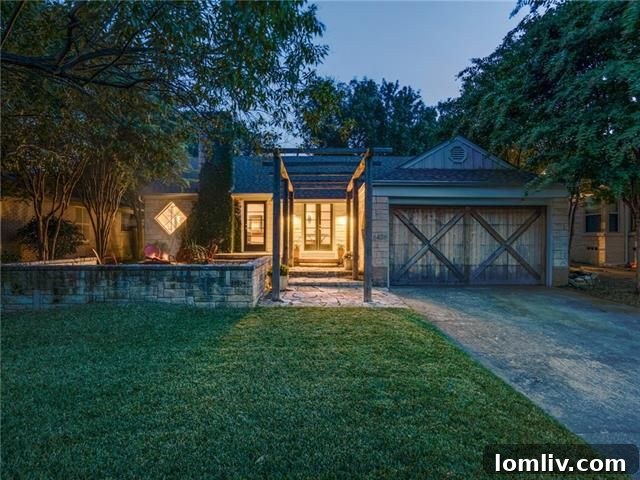 Front exterior showcasing fire pit and stone walkway of 6426 Vickery Blvd