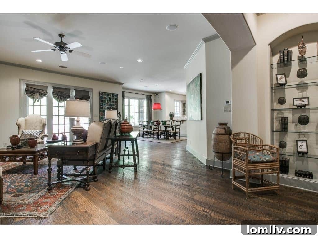 Expansive family room with custom built-ins and views of the garden