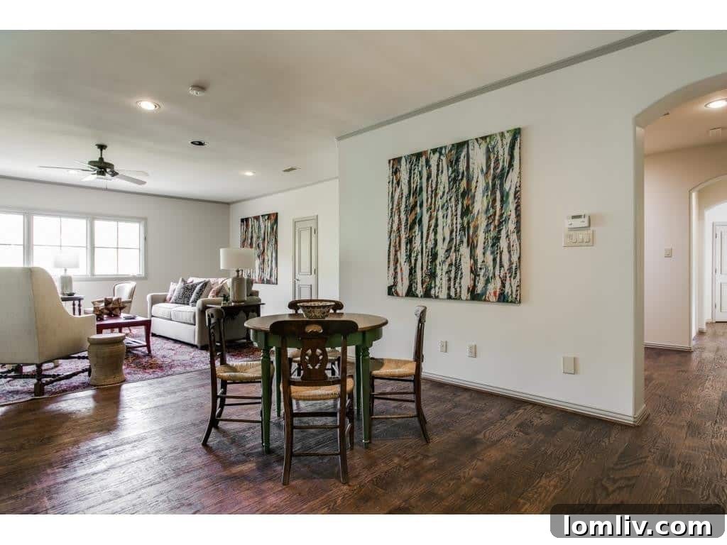 Spacious game room upstairs, perfect for entertainment and family activities