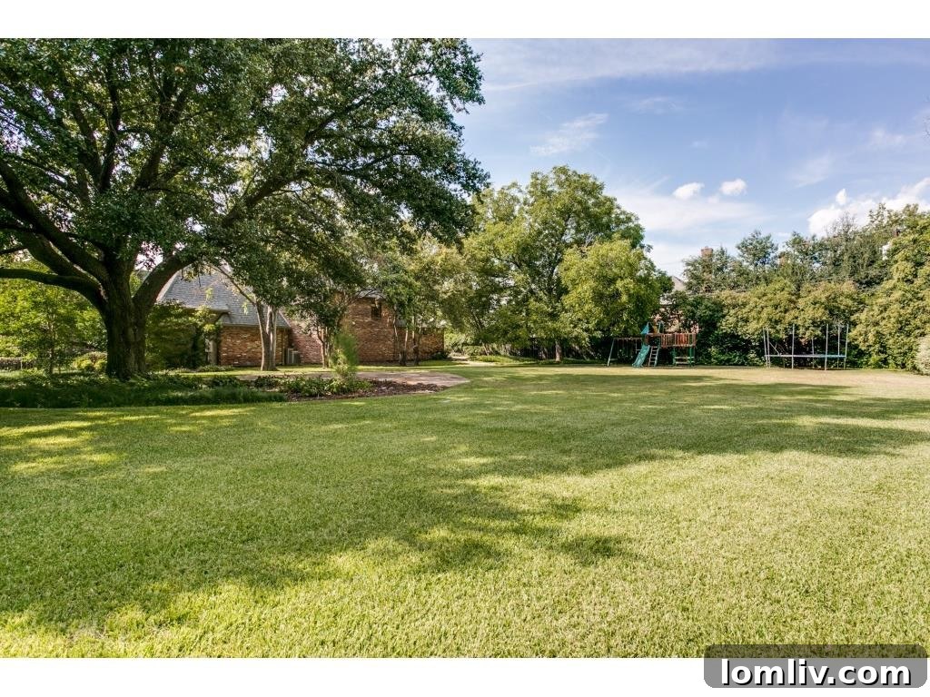 Expansive grounds of the double lot property, showcasing privacy and natural beauty
