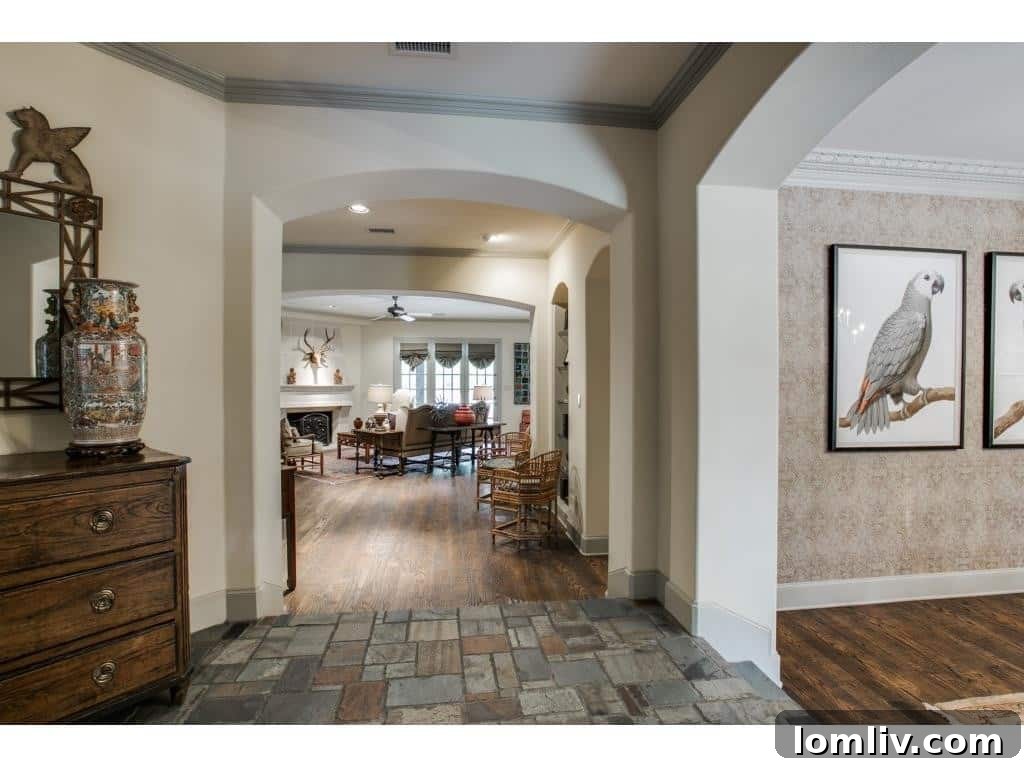 Front entrance and meticulously landscaped garden of a luxury Preston Hollow home