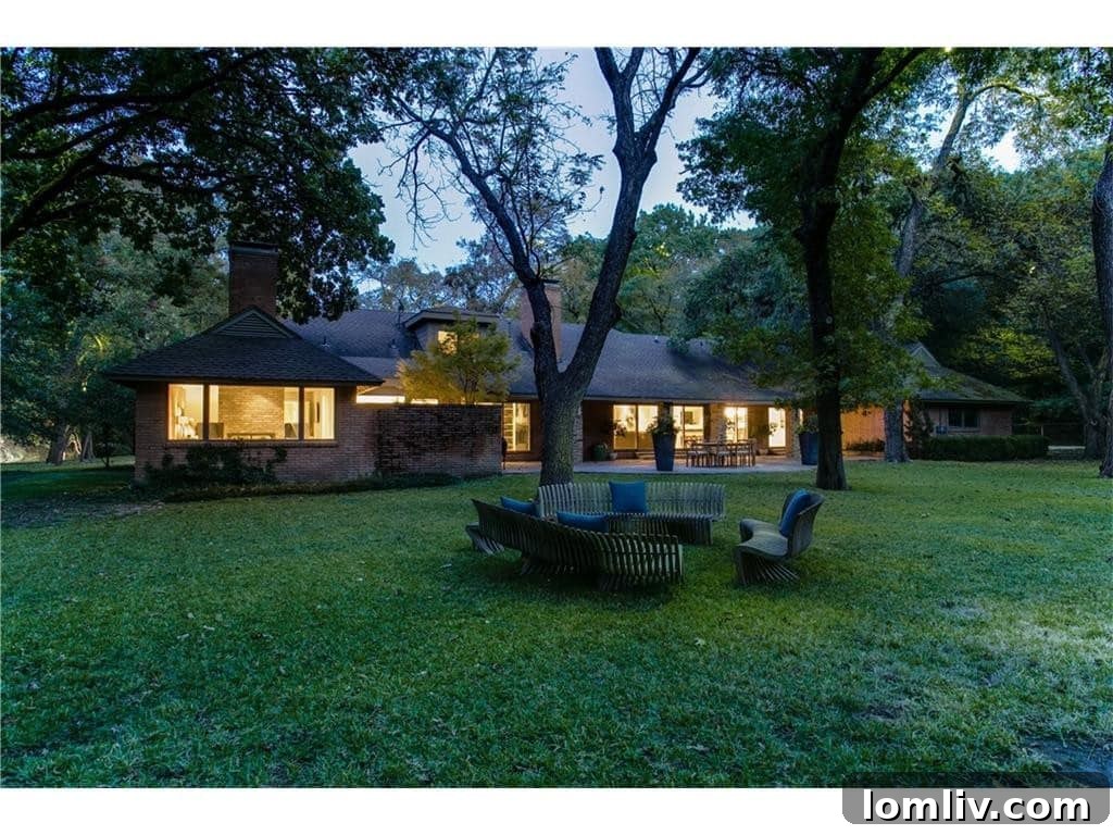 Rear Exterior of Luxury Home with Spacious Patio