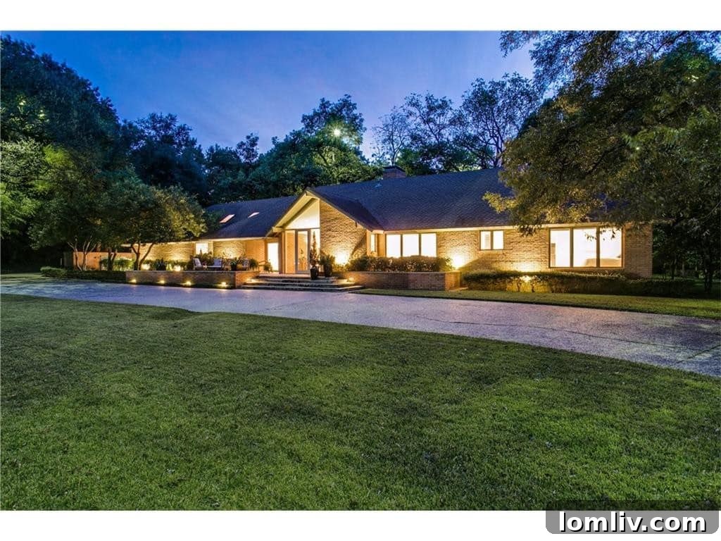 Exterior View of 626 Rainbow Drive, showcasing modern updates and natural surroundings