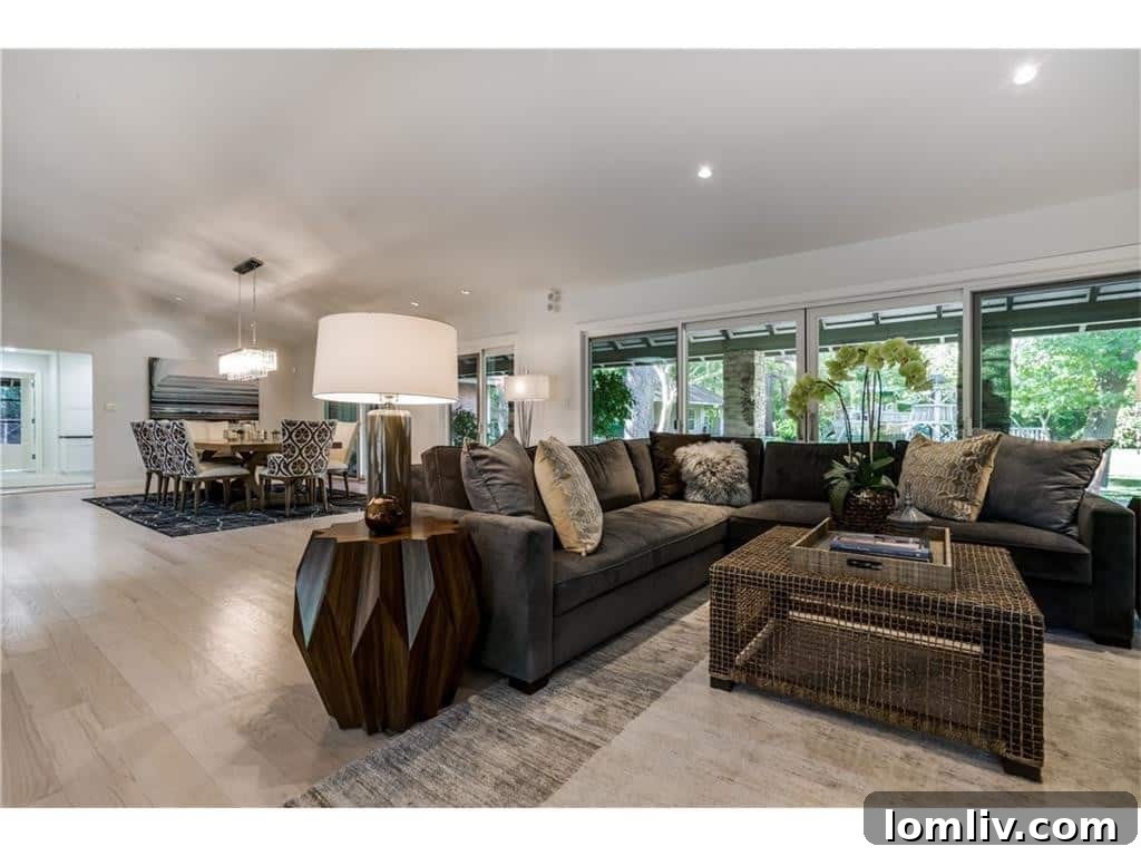 Expansive Living Room with Brick Fireplace at 626 Rainbow Drive