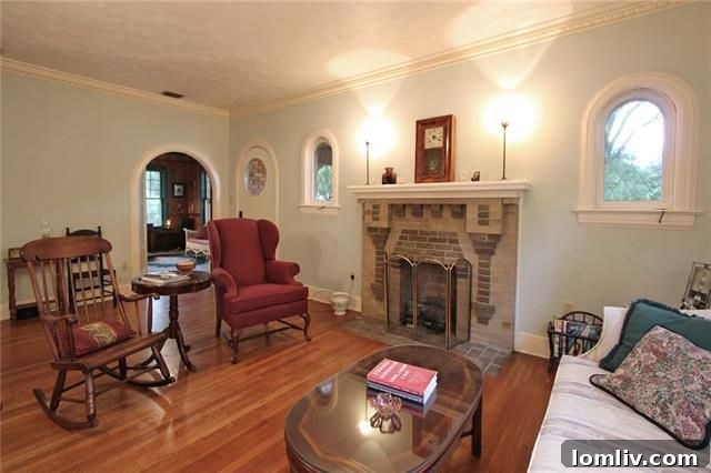 Charming living room with original fireplace in 5605 Ridgedale Ave.