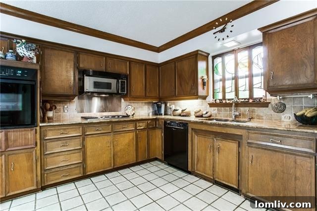 Spacious great room with a floor-to-ceiling stone fireplace.