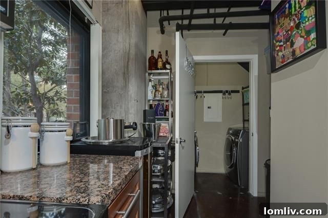 Kitchen Island with Breakfast Bar and Pendant Lighting