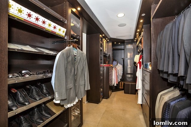 Expansive custom master closet with bespoke storage solutions