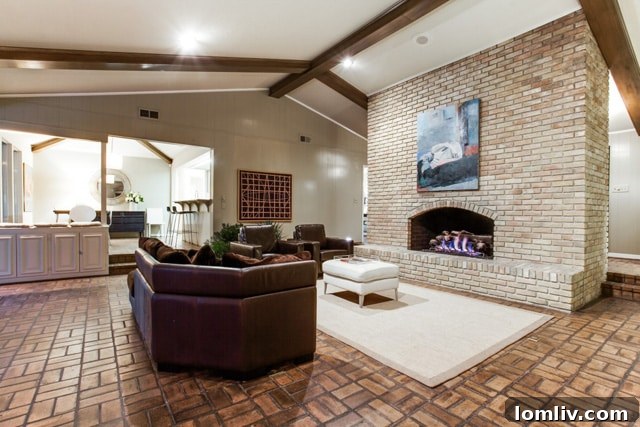 Open concept living area with abundant natural light at 6634 Greenwich Lane.