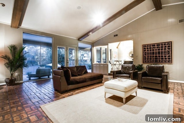 Another view of the sophisticated living space, perfect for entertaining.