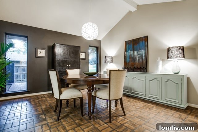 The sunken living room, a hallmark of mid-century modern design at 6634 Greenwich.