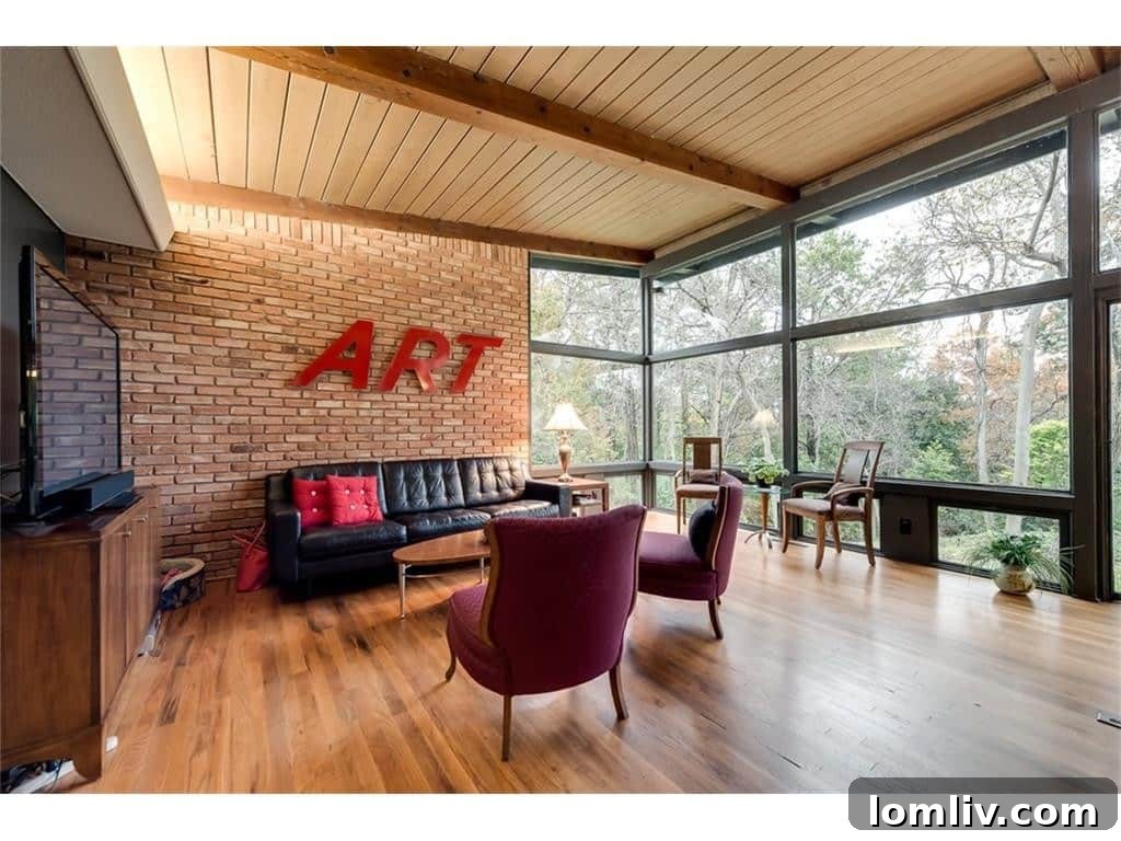 Spacious living room with views of the backyard