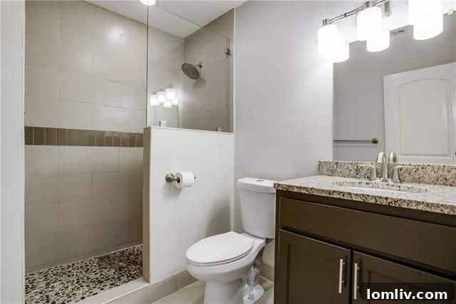 Park Forest Reno: Expansive 2,300+ SqFt with Open-Concept Living and Premium Amenities 22 Well-lit bedroom showcasing the newly installed carpet