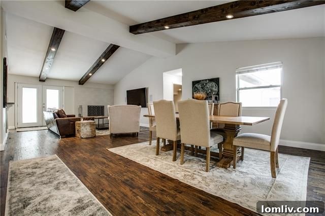 Park Forest Reno: Expansive 2,300+ SqFt with Open-Concept Living and Premium Amenities 6 View of the open concept living and dining area with handscraped wood floors and natural light